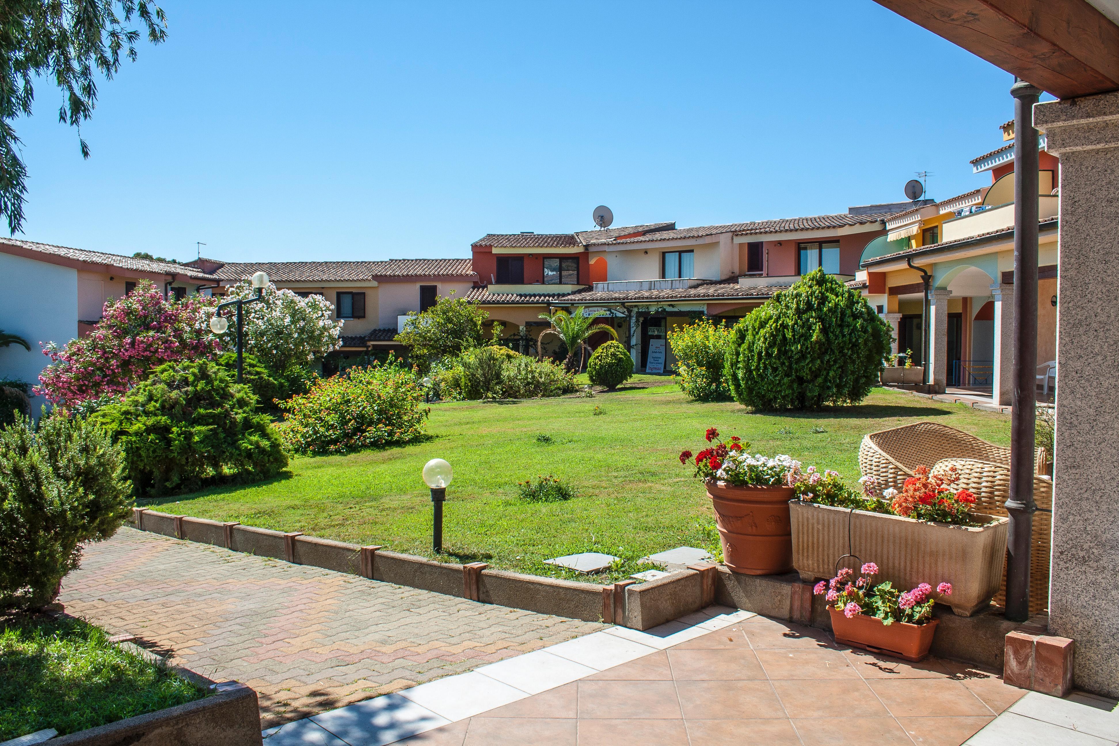 Residence Oasi Anfiteatro Porto Ottiolu Buitenkant foto