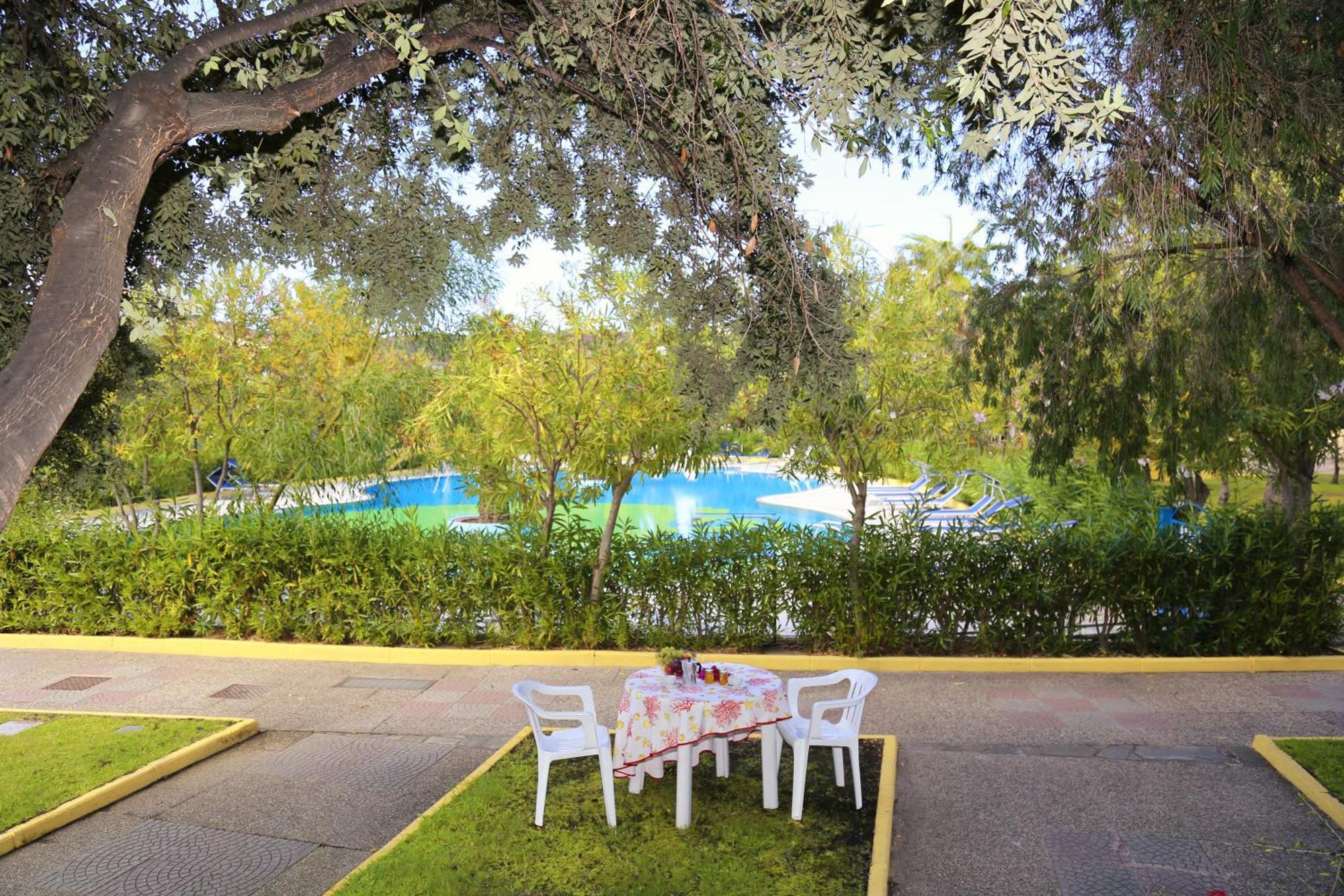 Residence Oasi Anfiteatro Porto Ottiolu Buitenkant foto